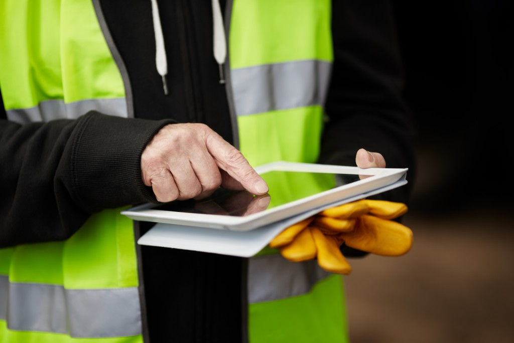 Worker wearing fluorescent vest