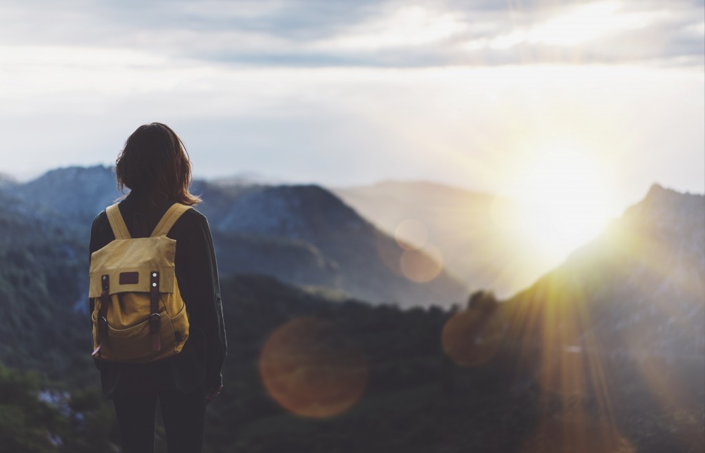 woman with a backpack hiking