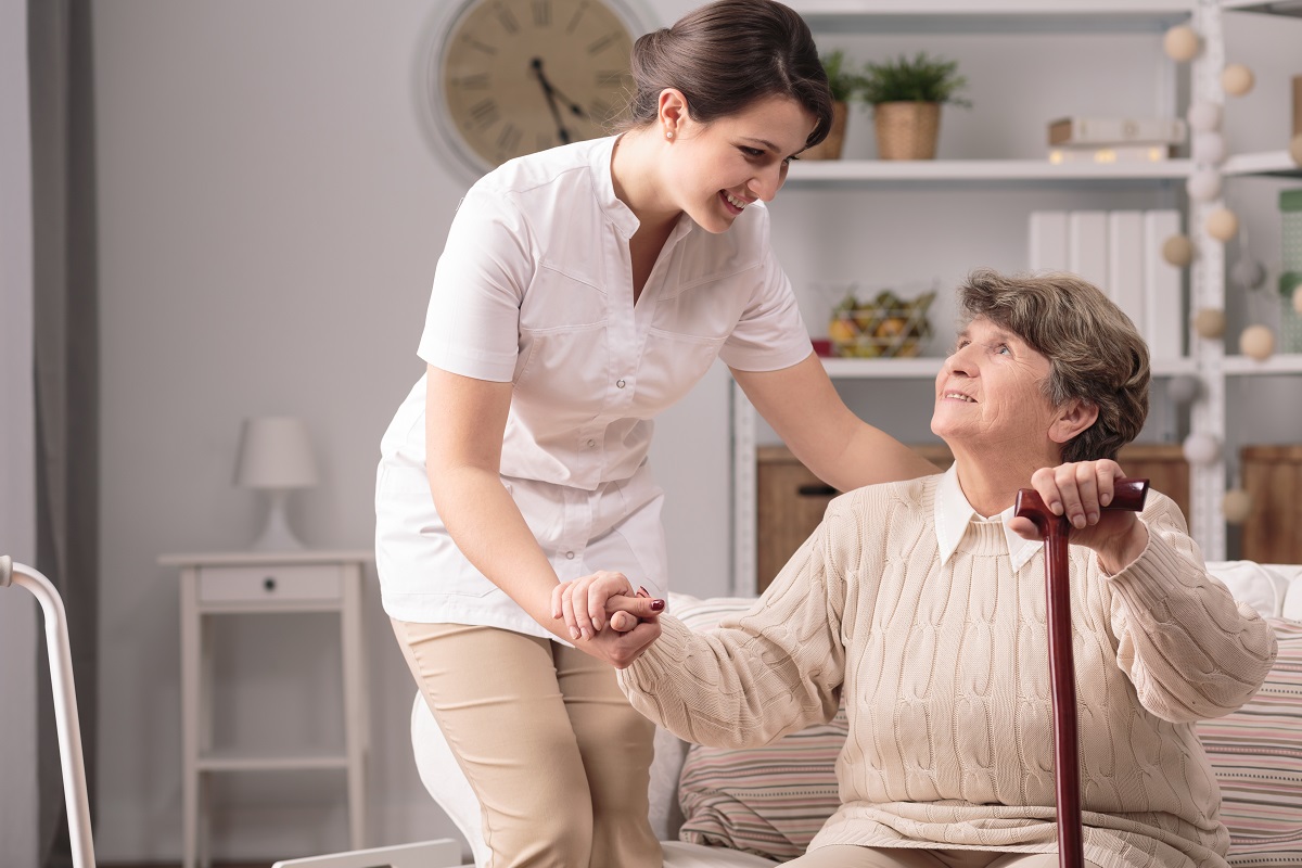 Elderly woman and nurse