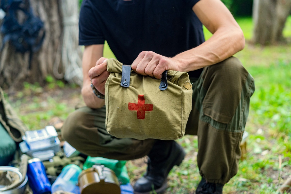 Man carrying a first aid kit