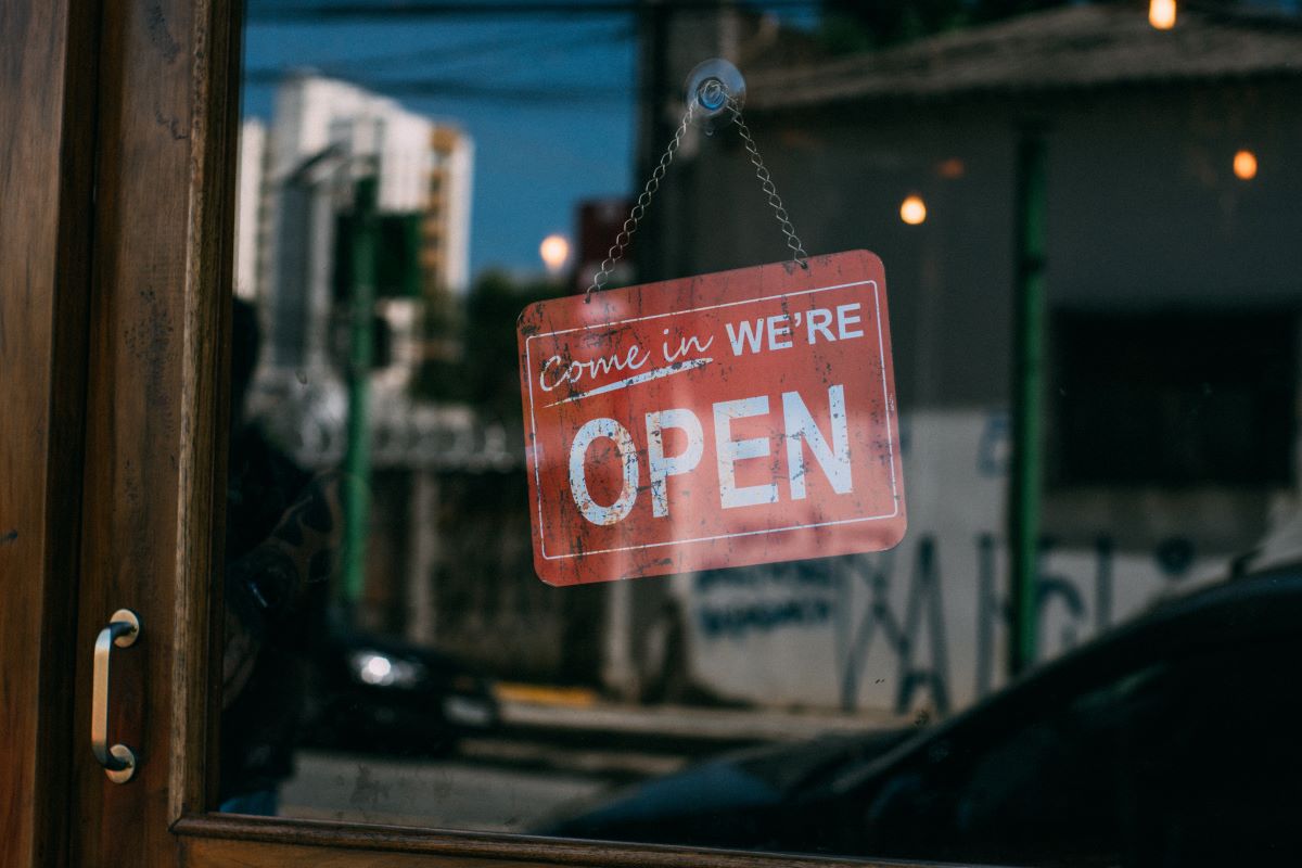 open sign on glass door