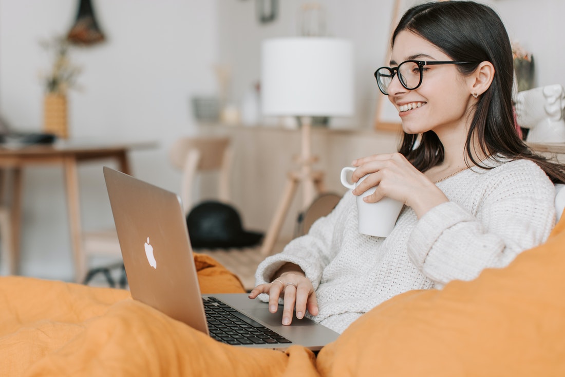 woman with laptop and coffee