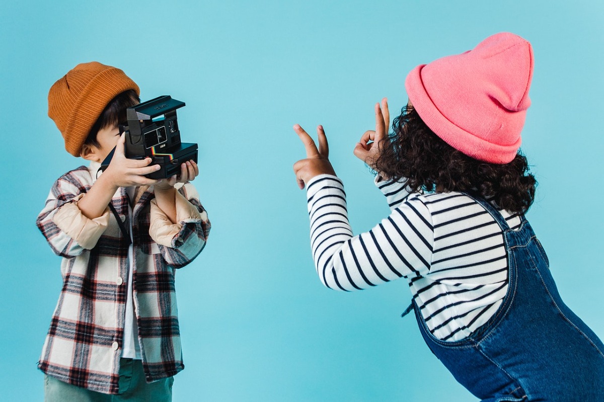 children taking photographs