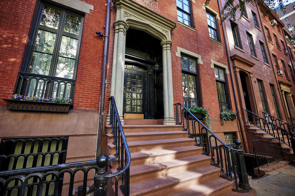 an apartment complex with brick as a building block