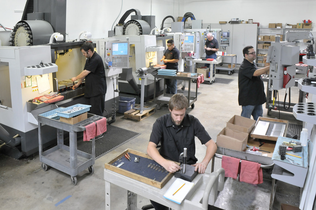 Workers in a machine shop