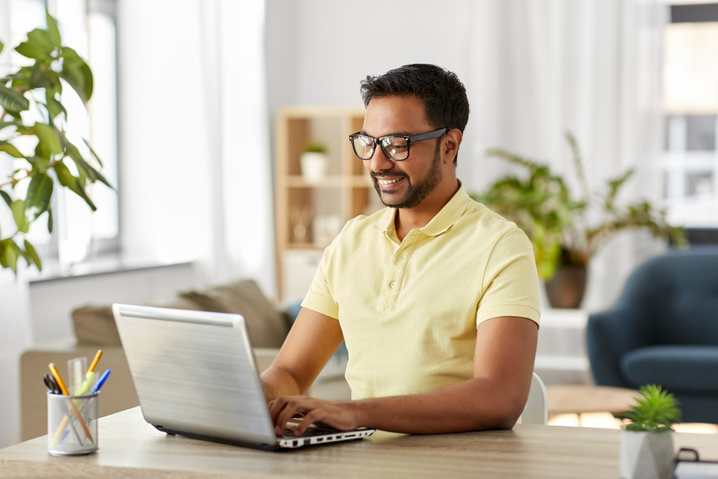 man using laptop