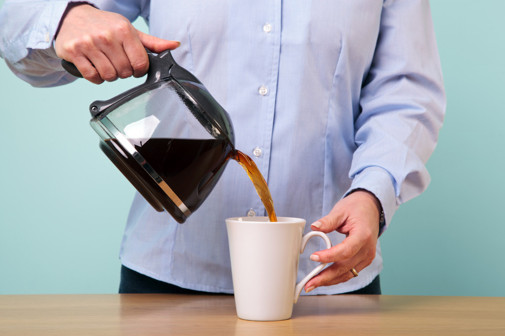 person going for a coffee break at work