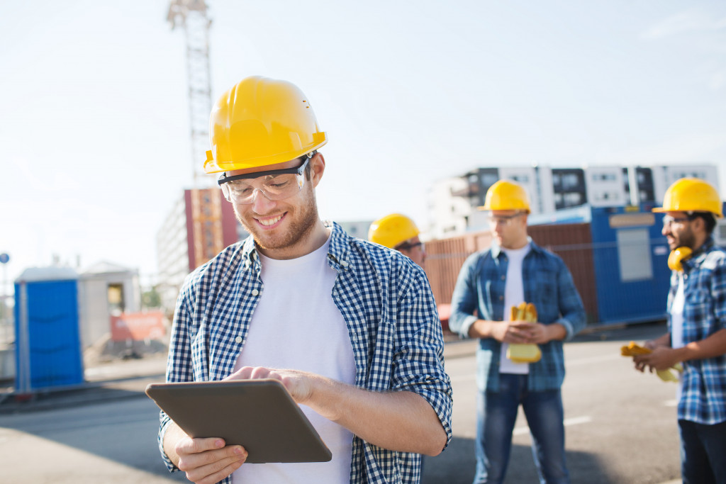 a team of construction workers outdoor during break