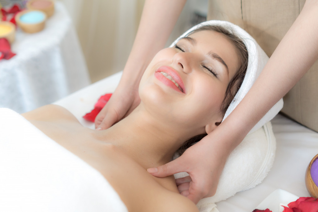 A woman getting a massage in a spa