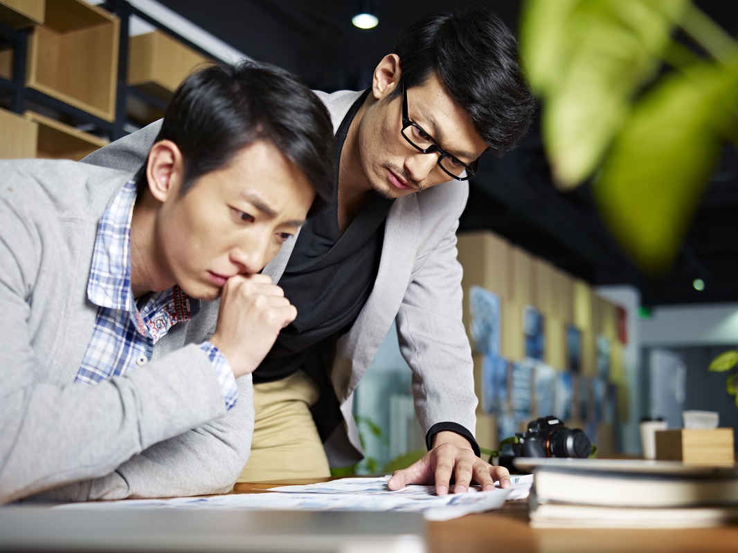 Employees providing services to a newly-opened business in Singapore.